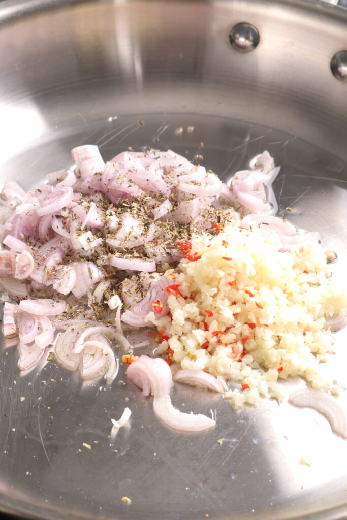 sauté onions, garlic and chilli in a frying pan