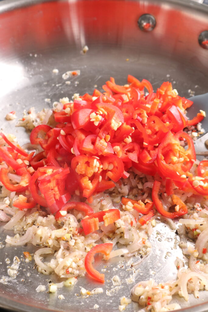 add more red chillies to a saucepan