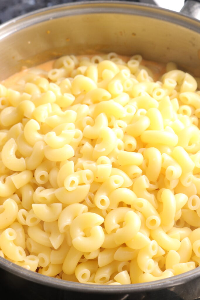 Macaroni and cheese sauce in a saucepan