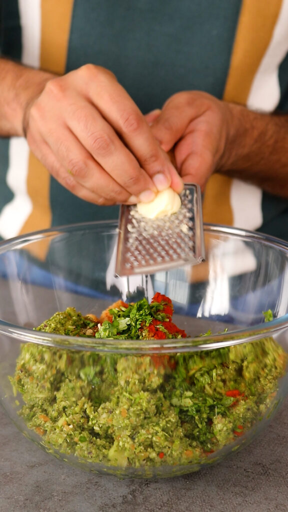 add spices and garlic to burger mix