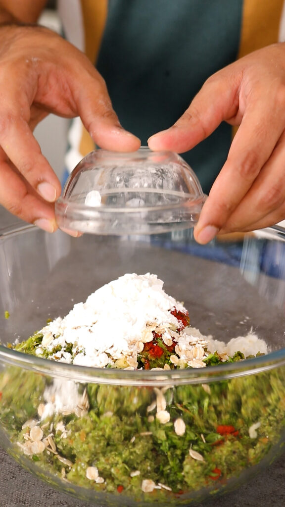 add oats, flour, and cornflour/corn starch to burger mix