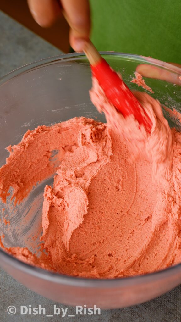 mixing strawberry Viennese whirls dough