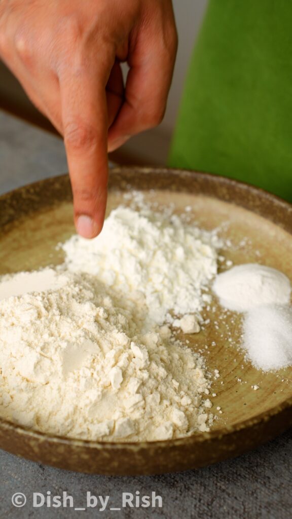 plain flour, cornflour, baking powder, and salt in a mixing bowl