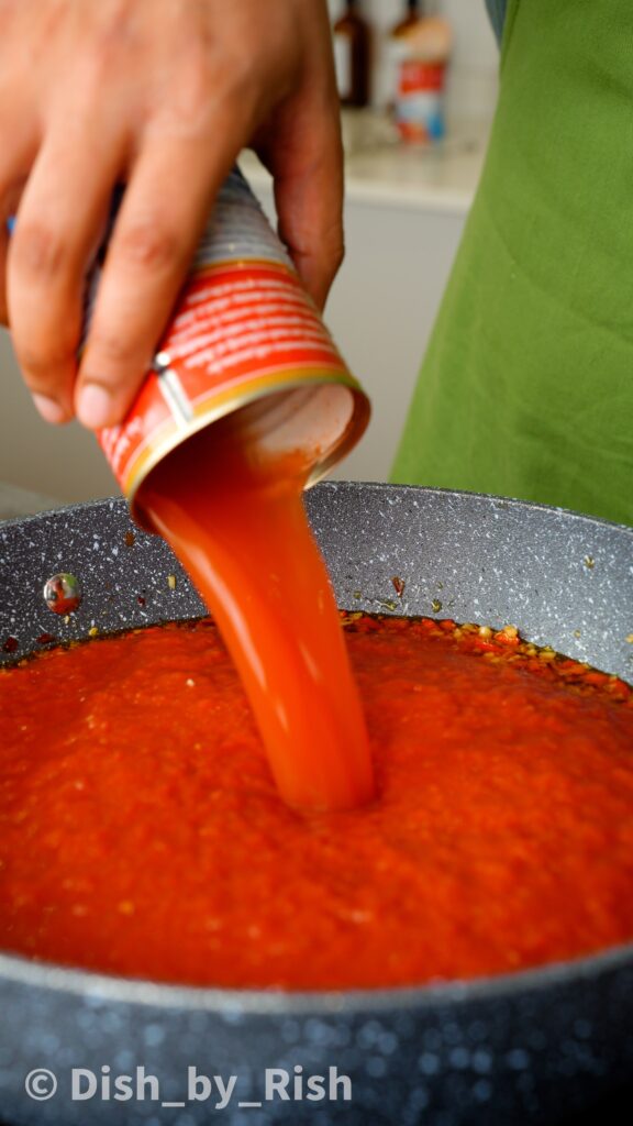 adding a splash of water to the saucepan