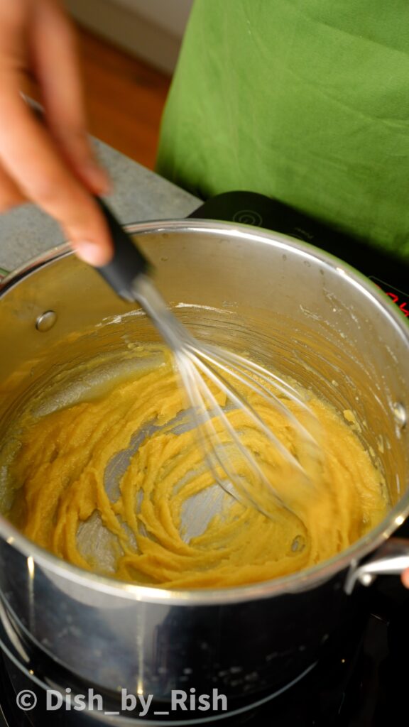 whisking flour and butter to form a roux