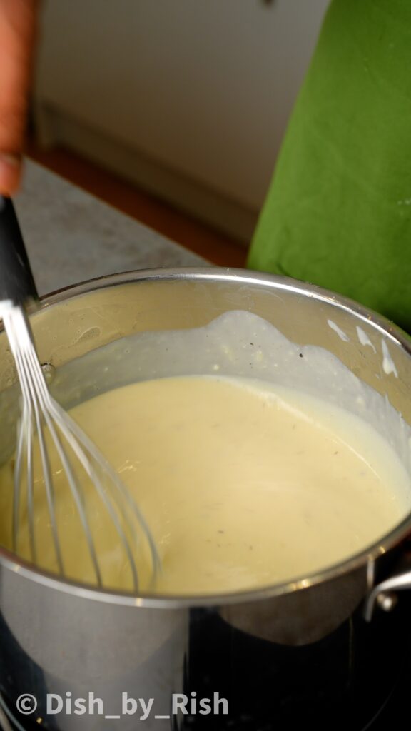 creamy béchamel sauce in a saucepan