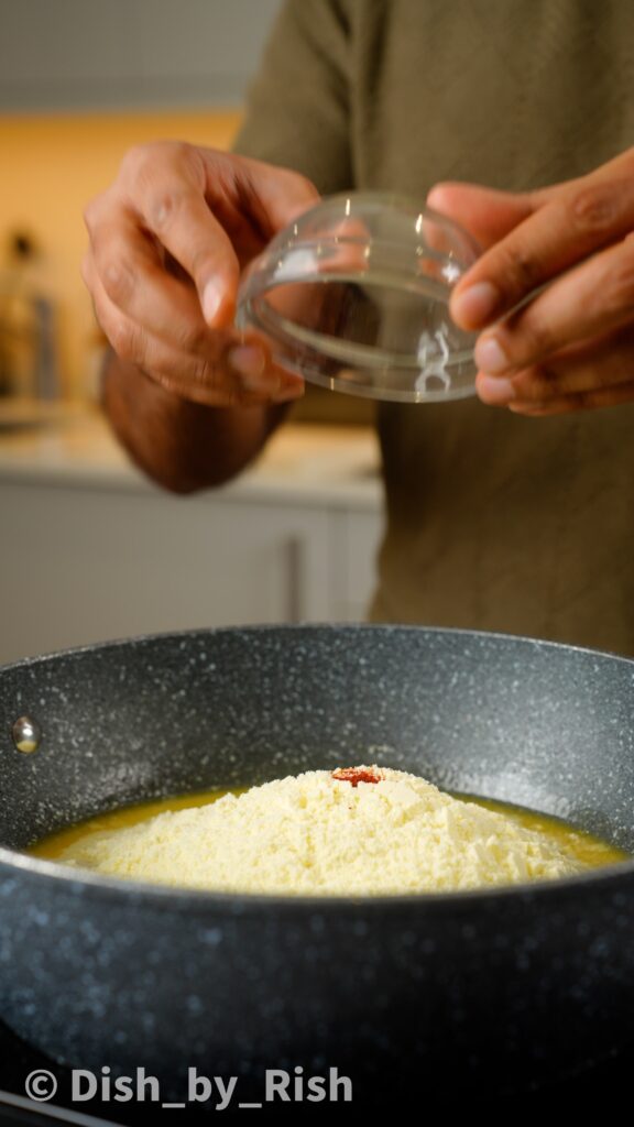 adding milk powder and saffron to pan