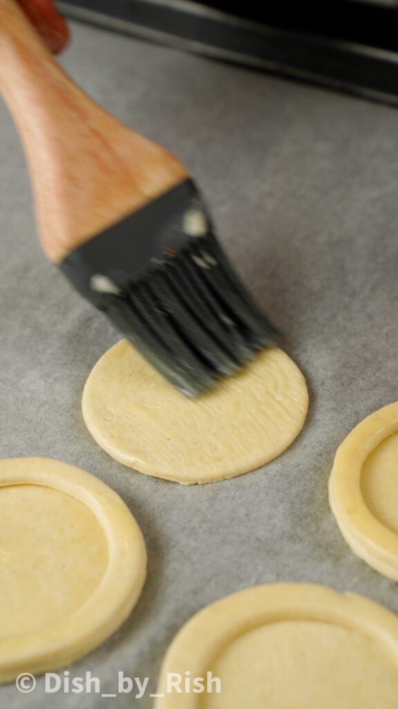 brushing glaze on puff pastry