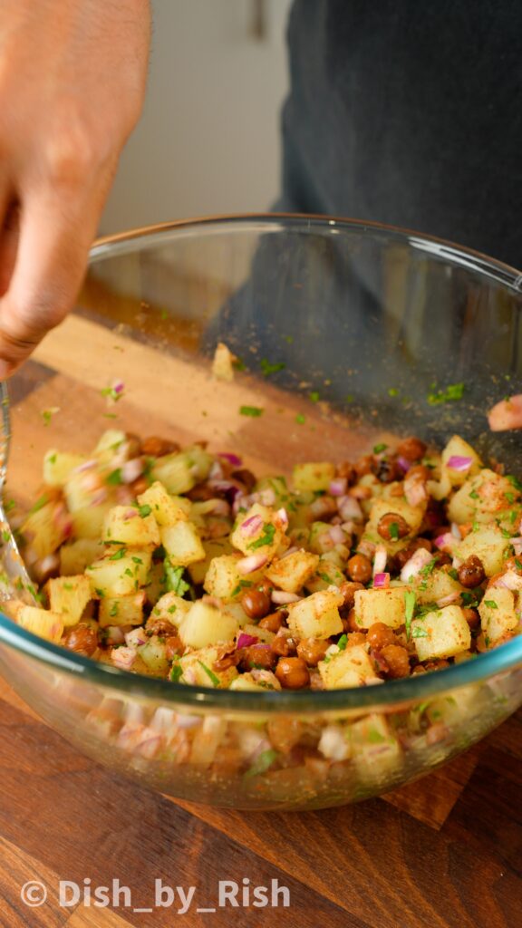 mixing potato and chickpea chaat filling