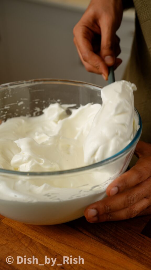 removing 1/4 of the whipped egg whites