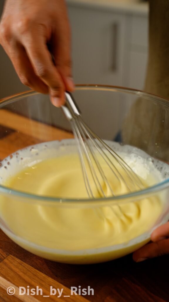 whisking white chocolate and cream