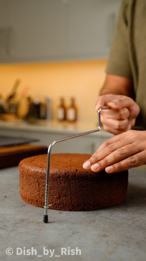 slicing chocolate chiffon cake