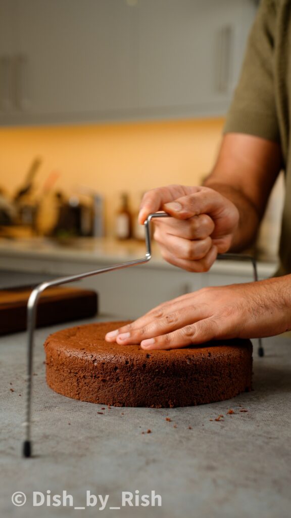 slicing chocolate chiffon cake