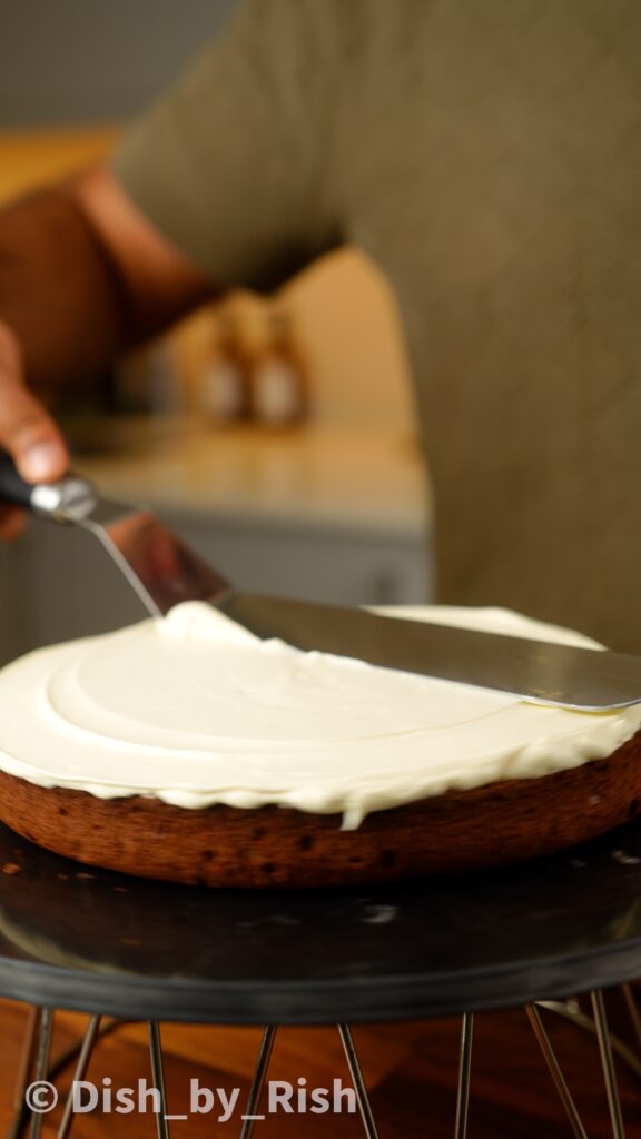 smoothed whipped cream on chiffon cake layer