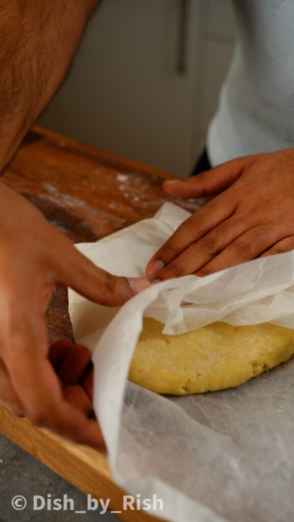 wrapping pastry dough in baking paper