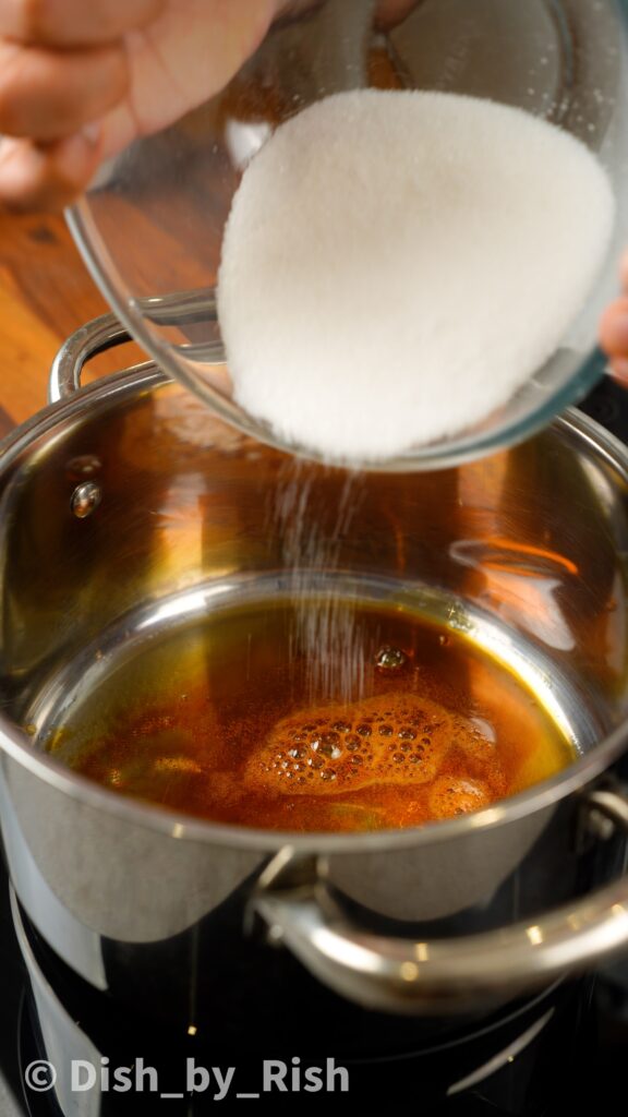 caramelising sugar in a saucepan