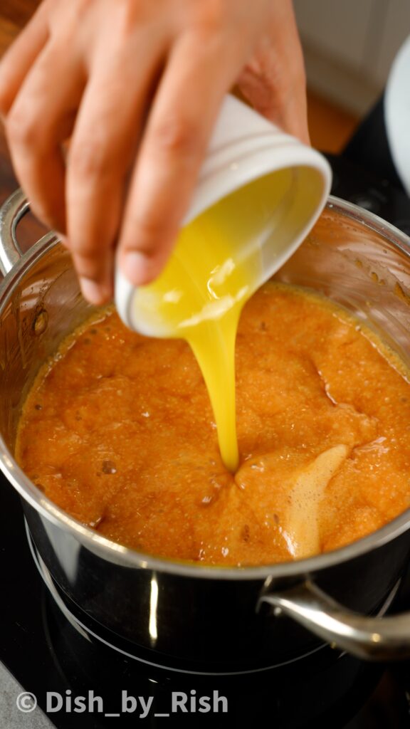 adding butter to caramel