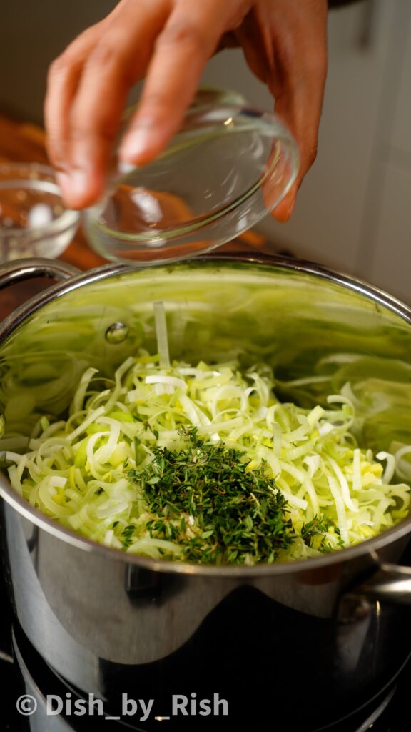 sautéing leeks, garlic, and thyme in butter