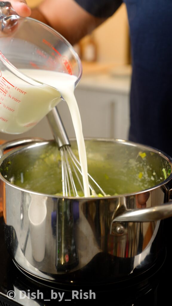 adding milk to saucepan