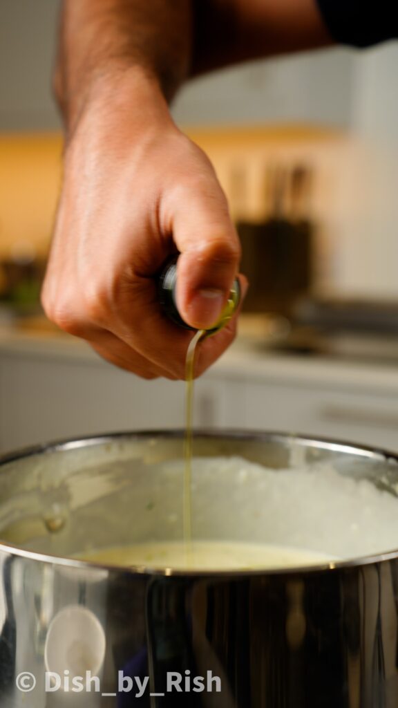 adding truffle oil to béchamel sauce