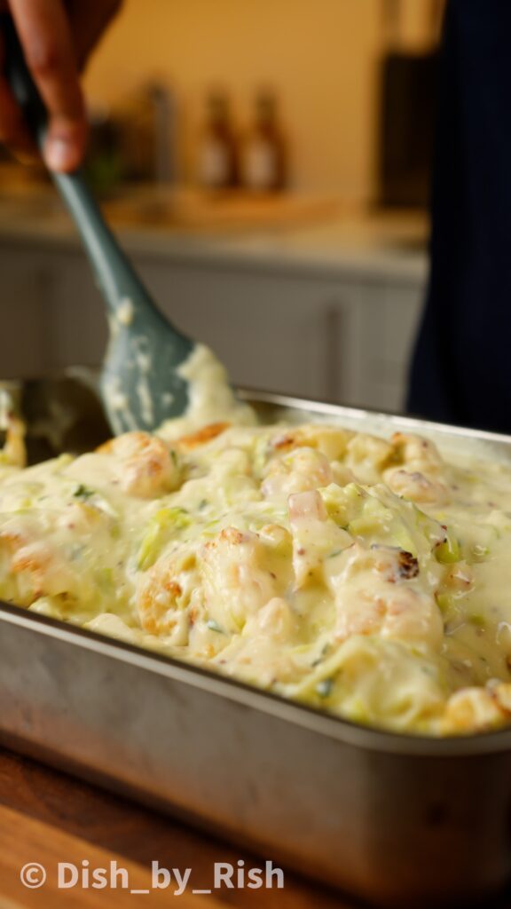 coating cauliflower in truffle cheese sauce