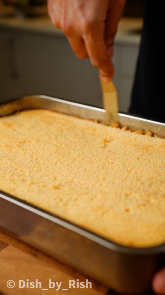 running spatula around the side of the cake