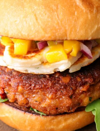 smoky aubergine burger/eggplant burger in a bun with mango salsa