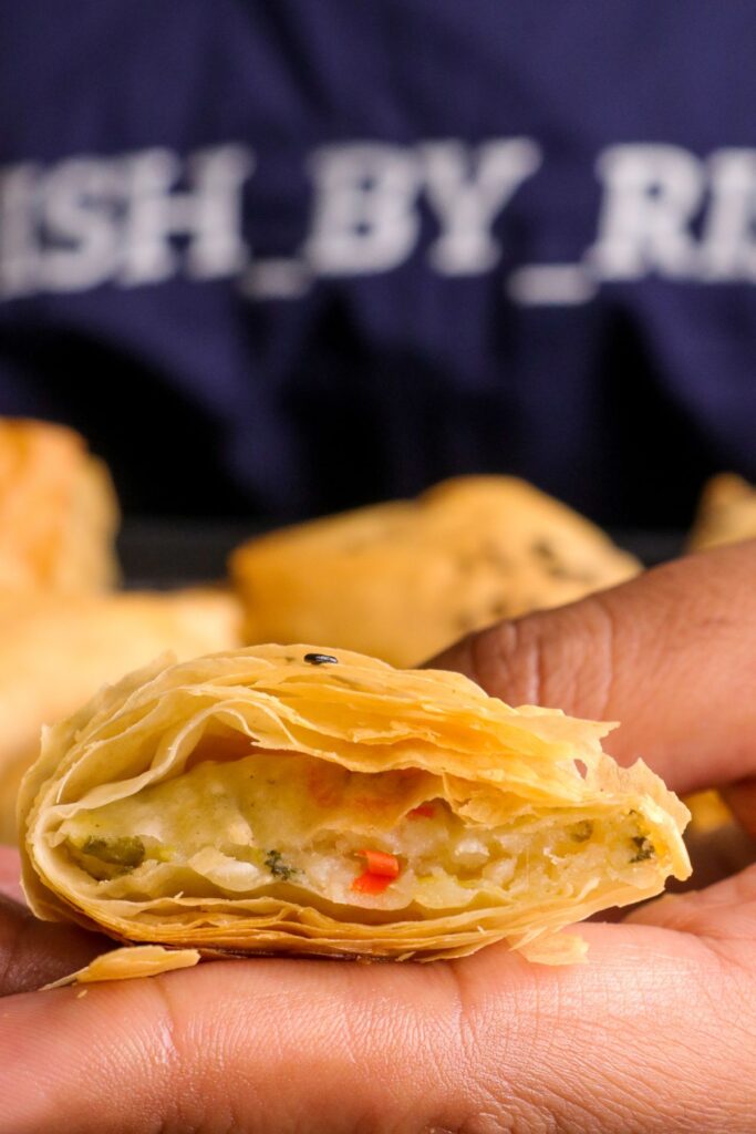 Flaky Potato and Brie parcel cut in half with cross section shown