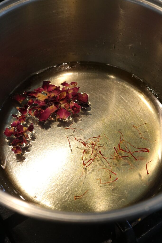 adding saffron and rose to sugar syrup