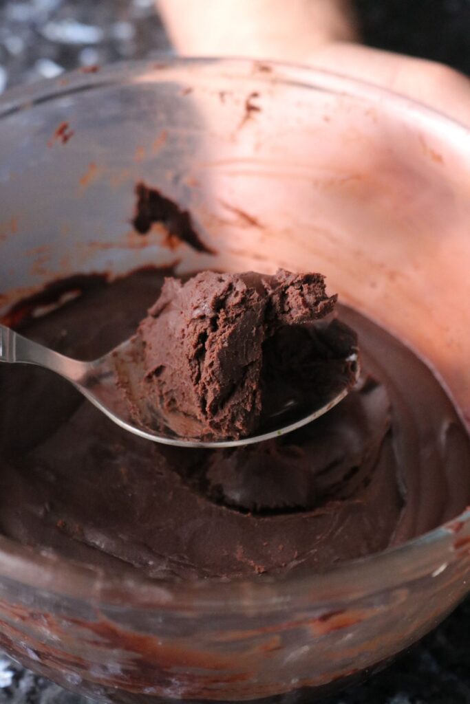 scoop of chilled ganache on a spoon