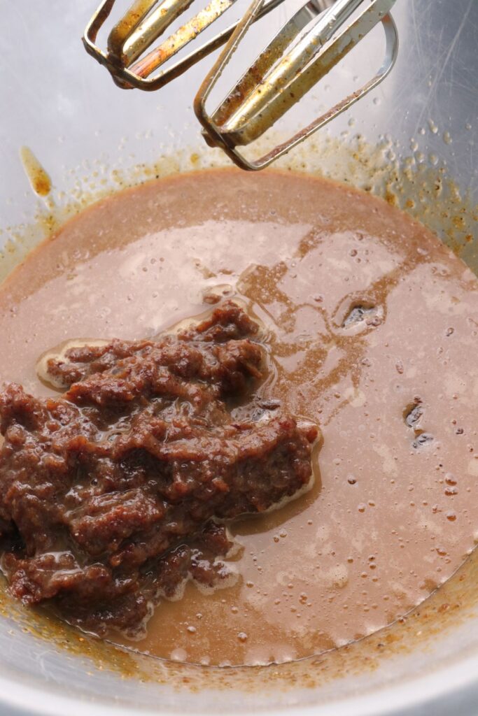 coffee and date puree added to mixing bowl