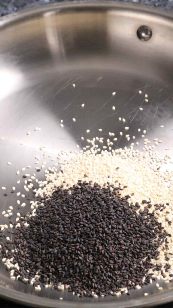 black and white sesame seeds in a pan