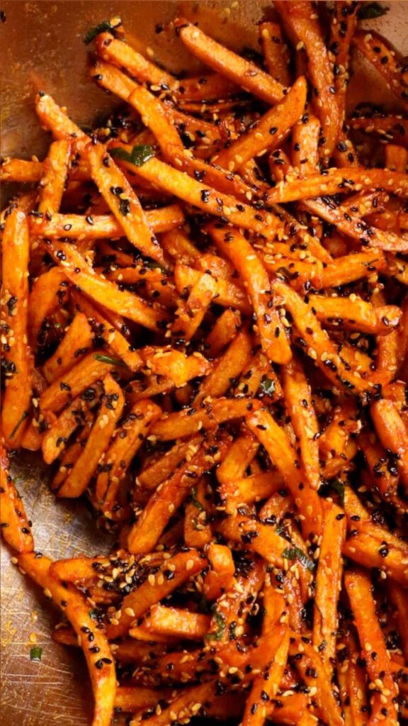 spicy garlic and sesame fries in a bowl