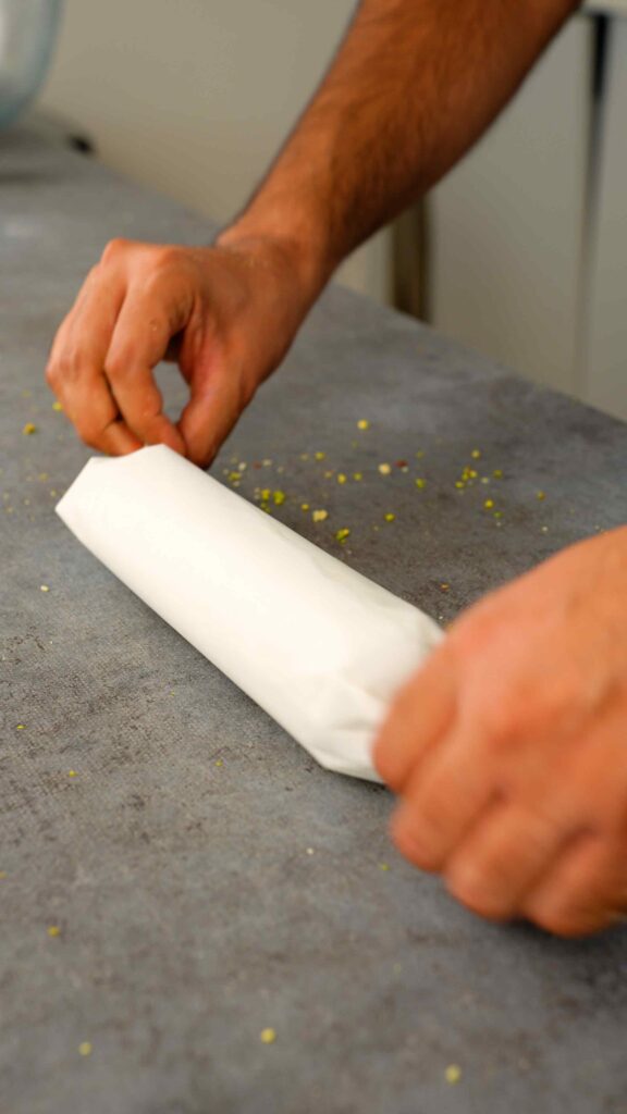 roll shortbread in baking paper or clingfilm